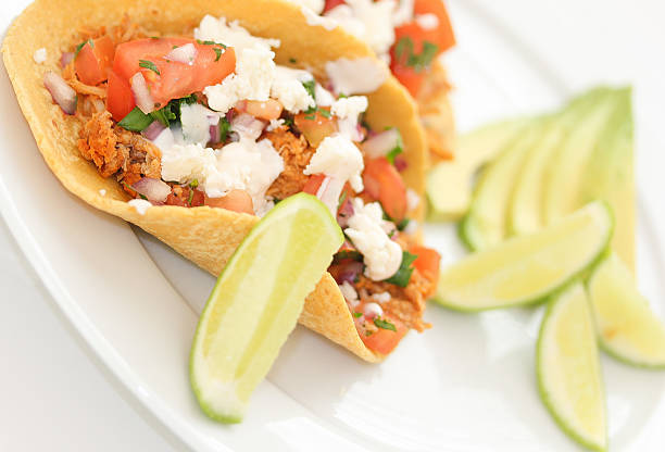 Tacolab LA authentic pollo asado tacos for catering in Los Angeles. Grilled chicken tacos with fresh pico de gallo, cheese, cilantro, and lime wedges on corn tortillas.