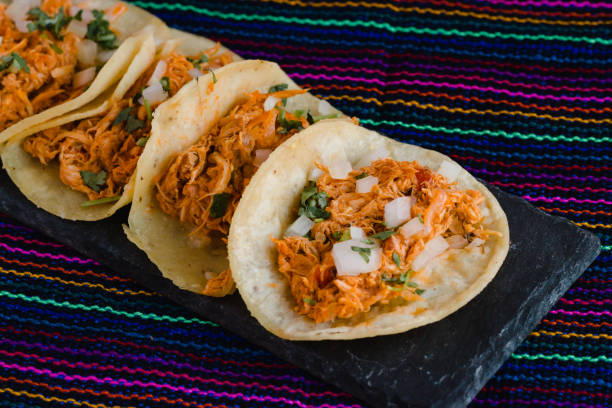 Tacolab LA tinga tacos with shredded chipotle chicken for premium catering in Los Angeles. Spicy and flavorful Mexican option.
